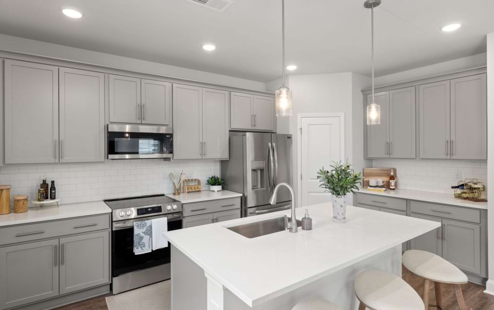 Forsyth (Heritage) - 4 bedroom floorplan layout with 2.5 bathrooms and 1975 square feet (Gourmet Designer Kitchen)