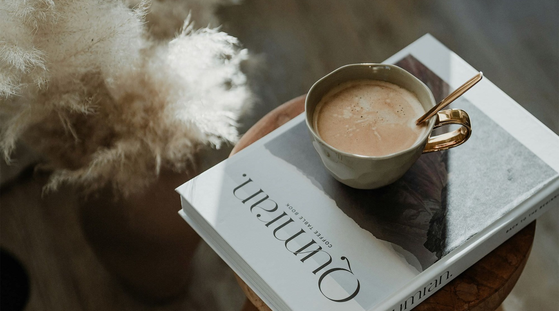 a cup of coffee on a book